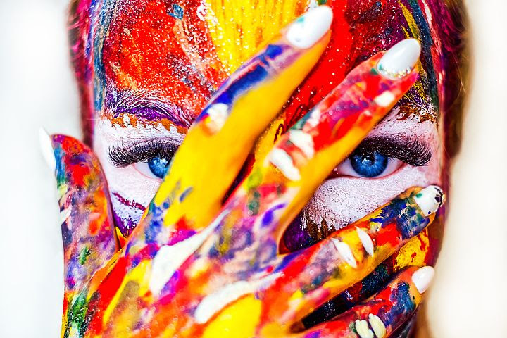 a colorful face of a woman