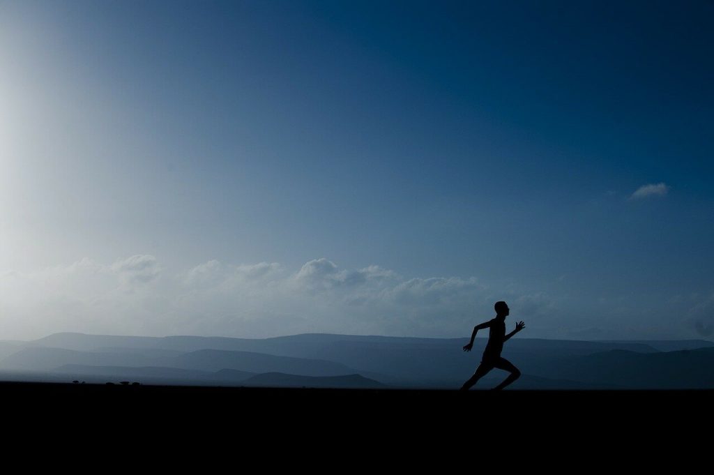 a man running to emphasize creating a routine