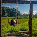 on a swing in bali