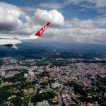 a plane flying over malaysia