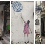 boy+and+girl+reaching+up+cat+looking+street+art+penang+malaysia