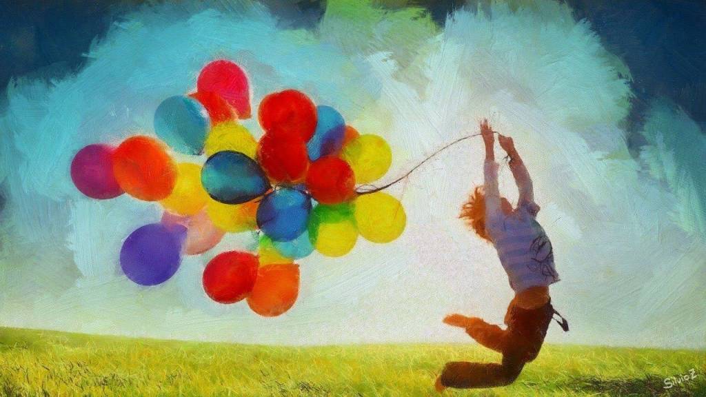 a boy seem happy with colorful balloons.jpg