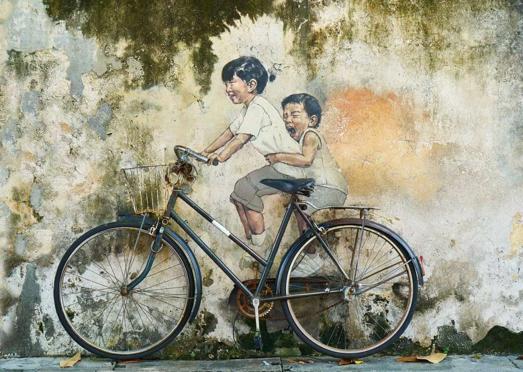 street art in penang boy and girl on cycle used in life quotes to show how simple life could be (2)