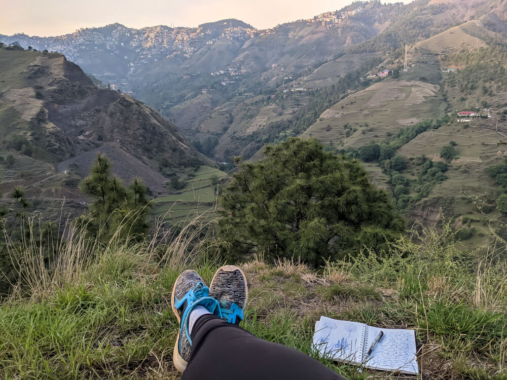 writing about travel on the mountain in-the-mehli-forest-himachal himalayas