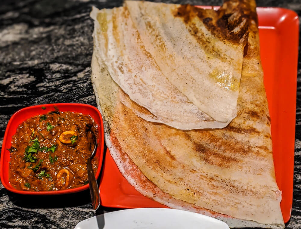 plain dosa with squid curry karnataka south india