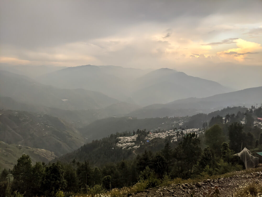 a misty evening on fagu and surrounding villages of shimla himachal pradesh