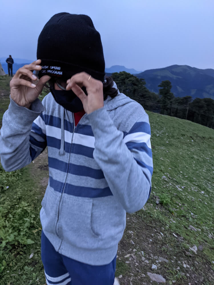 covering in cold on shikari devi hill