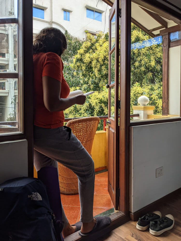 reading in the balcony casa cottage