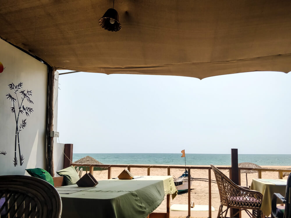 sitting on a beach shack agonda goa