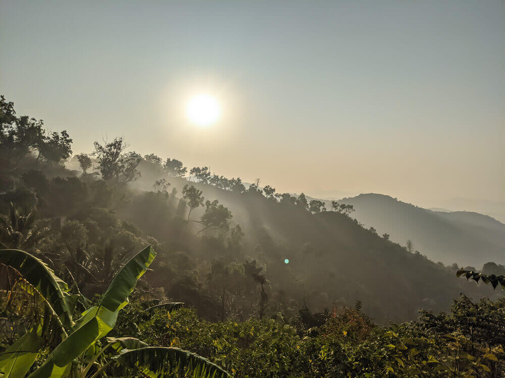 sunrise over coffee kingdom of coorg