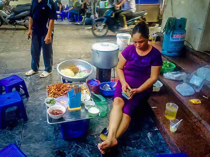 Fish Soup, Crazy Streets, and Night Markets in Saigon 2 a soup vendor in vietnam in 2016