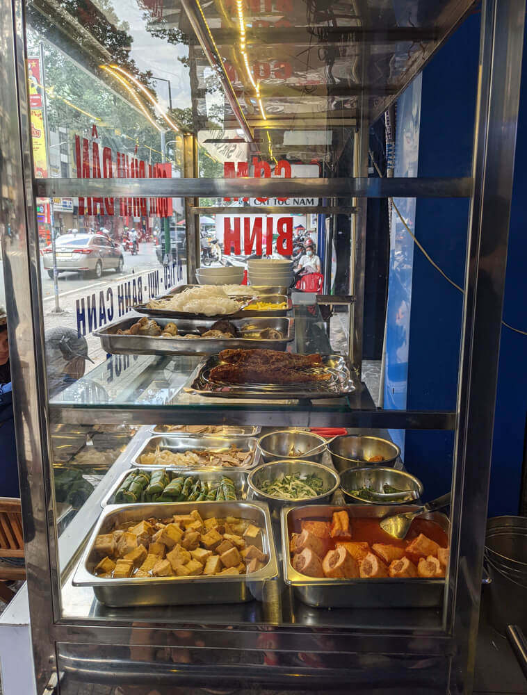 Fish Soup, Crazy Streets, and Night Markets in Saigon 11 buffet-display-lunch-menu-saigon.jpg
