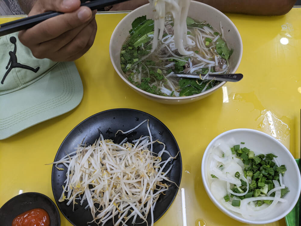 Fish Soup, Crazy Streets, and Night Markets in Saigon 4 my-partners-beef-pho-beef-noodle-soup.jpg