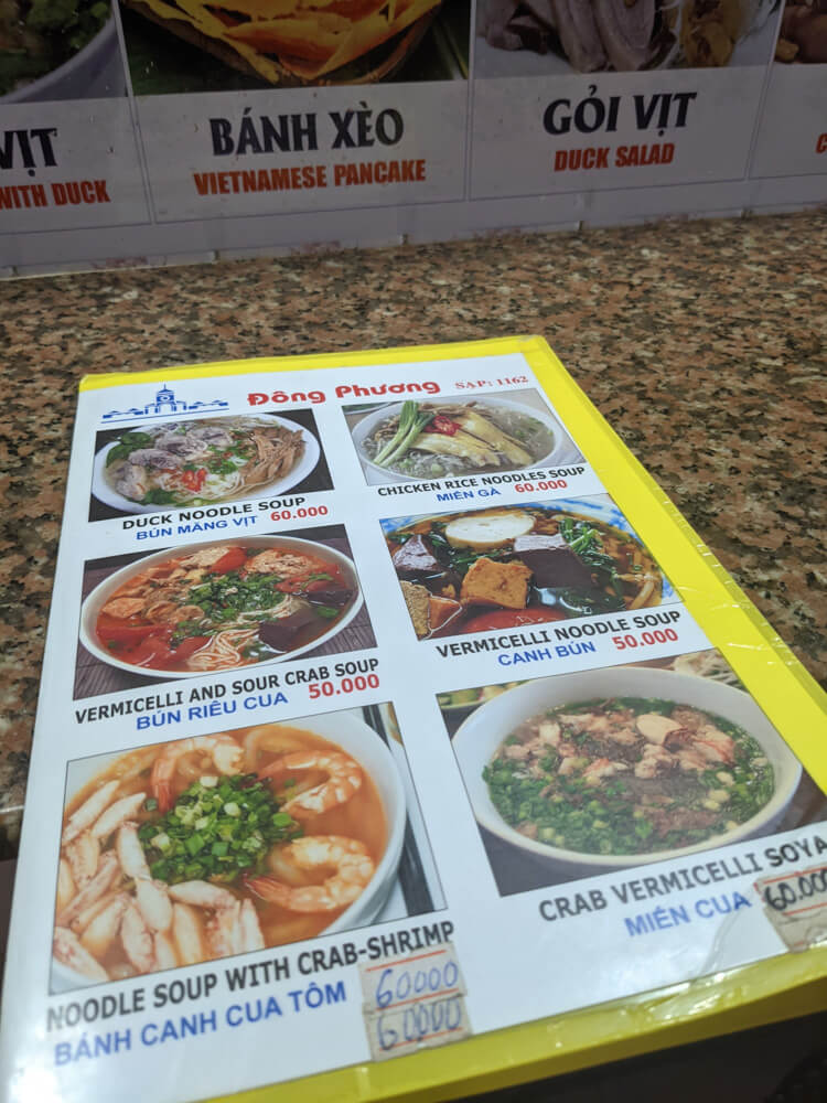 Fish Soup, Crazy Streets, and Night Markets in Saigon 14 noodle-soup-meny.jpg