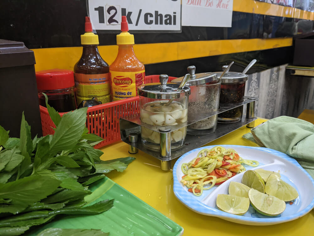 Fish Soup, Crazy Streets, and Night Markets in Saigon 6 the many things you get with pho vietnam