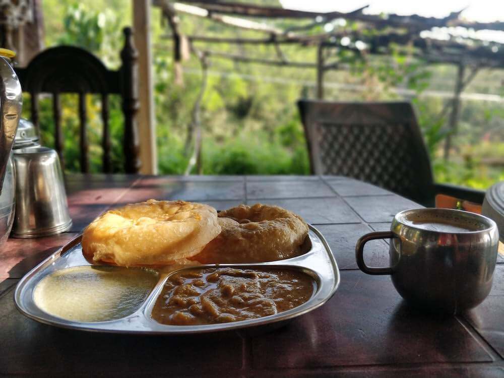 the typical breakfast of chana poori