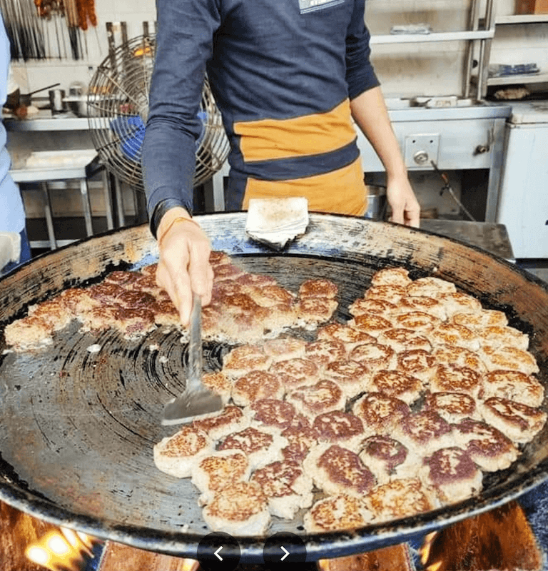 tunday kebabs being made in lucknow outside the popular tunday kebabi shop