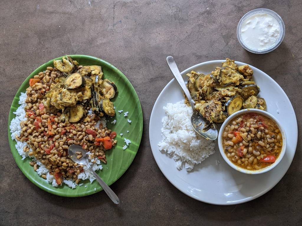 a homemade meal displaying rice lobhia raw banana of which i am proud