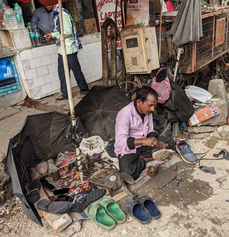 another guy hard at work on the road in siliguri