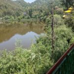 from the balcony outside my room in rewalsar monastery the view of rewalsar lake homeless to home