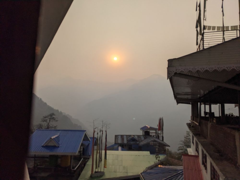 sunrise above the eastern Himalayas from my room's window in Gangtok