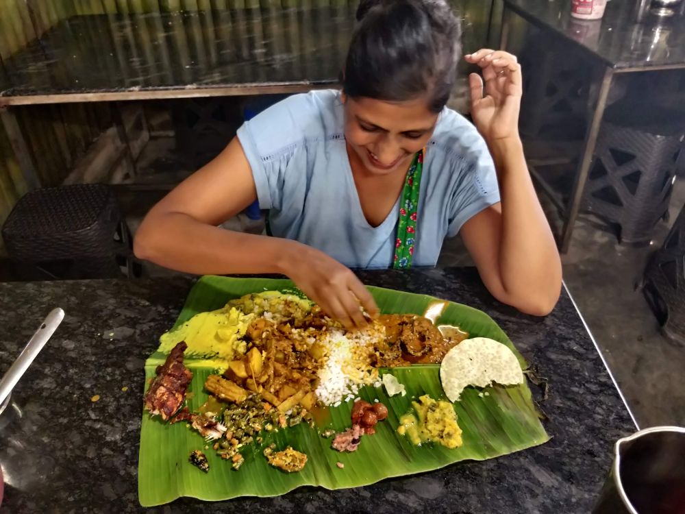 eating kerala meal full banana leaf the author