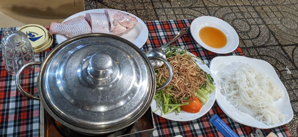 ingredients of a hot pot fish noodles vegetables