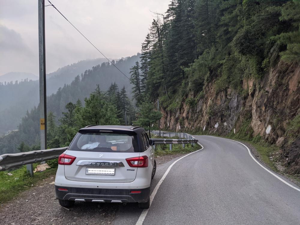 a car standing on a mountain road