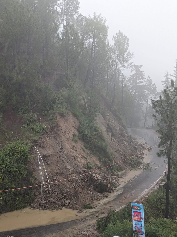 landslide in himachal pradesh. see the landslide on the road