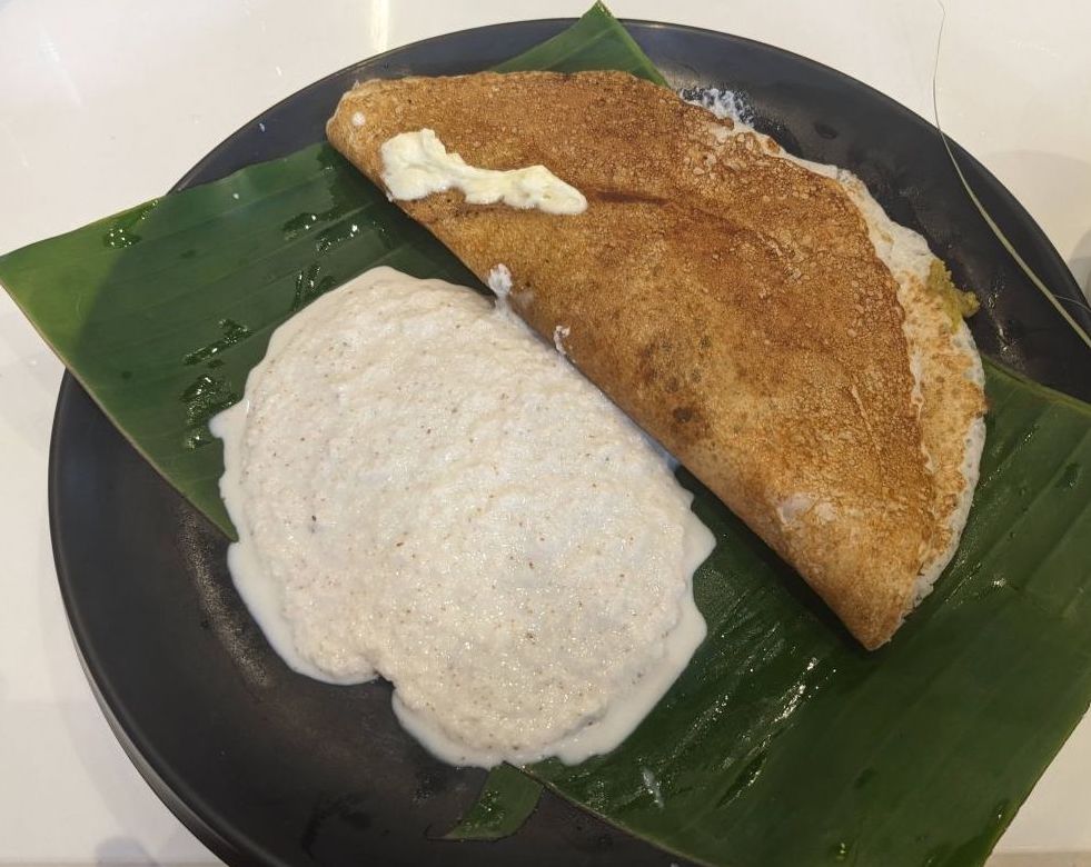 butter benne dosa mysore old hotel a plate of dosa with coconut chutney