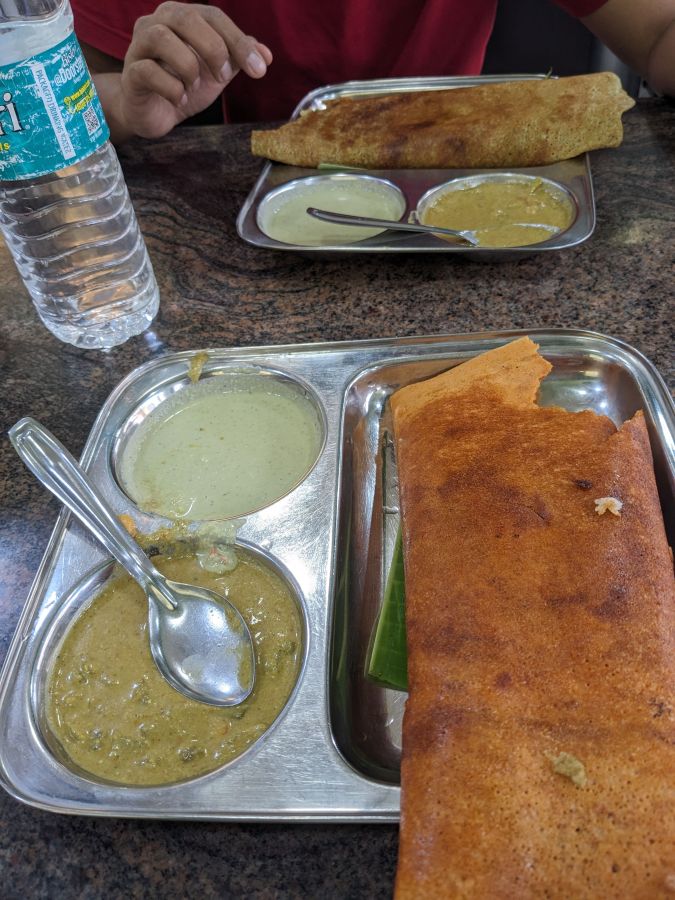 masala dosa in mysore on a table two masala dosas