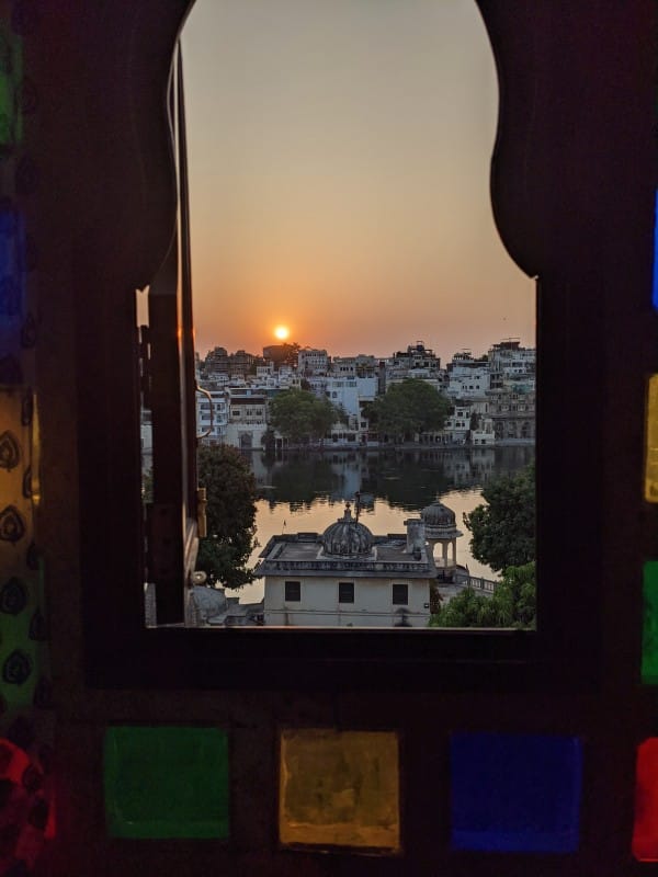 watching the sunrise from my bedroom window pichola lake