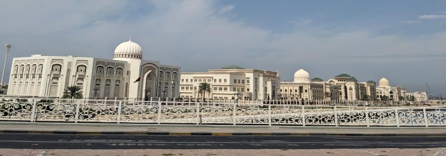 Dusty Sharjah: The Poorer Brother of Abu Dhabi and Dubai 22 the government department buildings across the road Sharjah