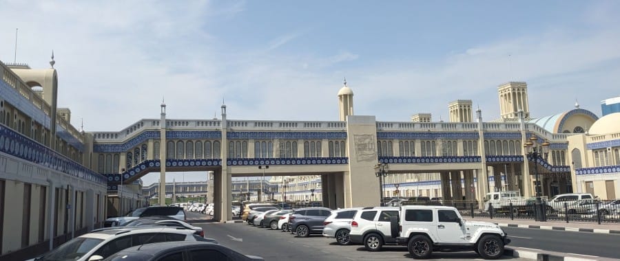 Dusty Sharjah: The Poorer Brother of Abu Dhabi and Dubai 28 the long extensive blue mosaic building gold souq sharjah (1)