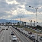 highway cars mountains sea izmir city used for feature image of bus from istanbul to izmir turkey article