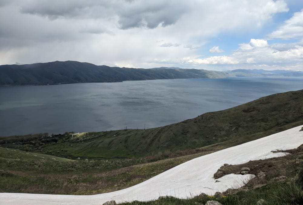 hiking around lake sevan in armenia in picture sevan lake blue homes icy paths (1)