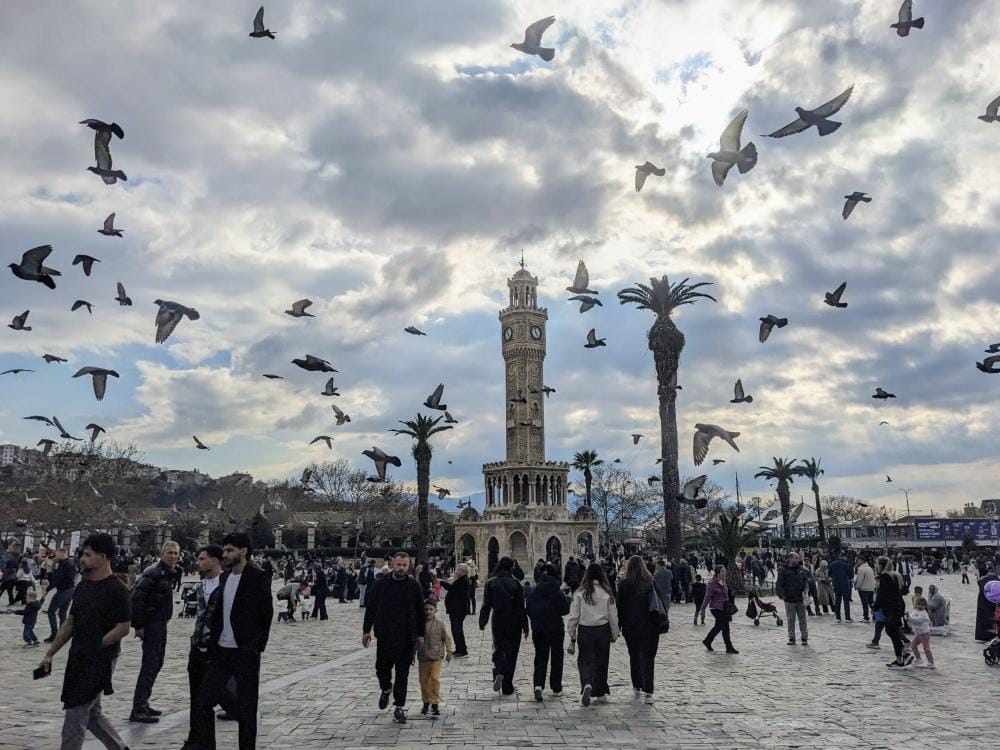 izmir city fountain pigeons people