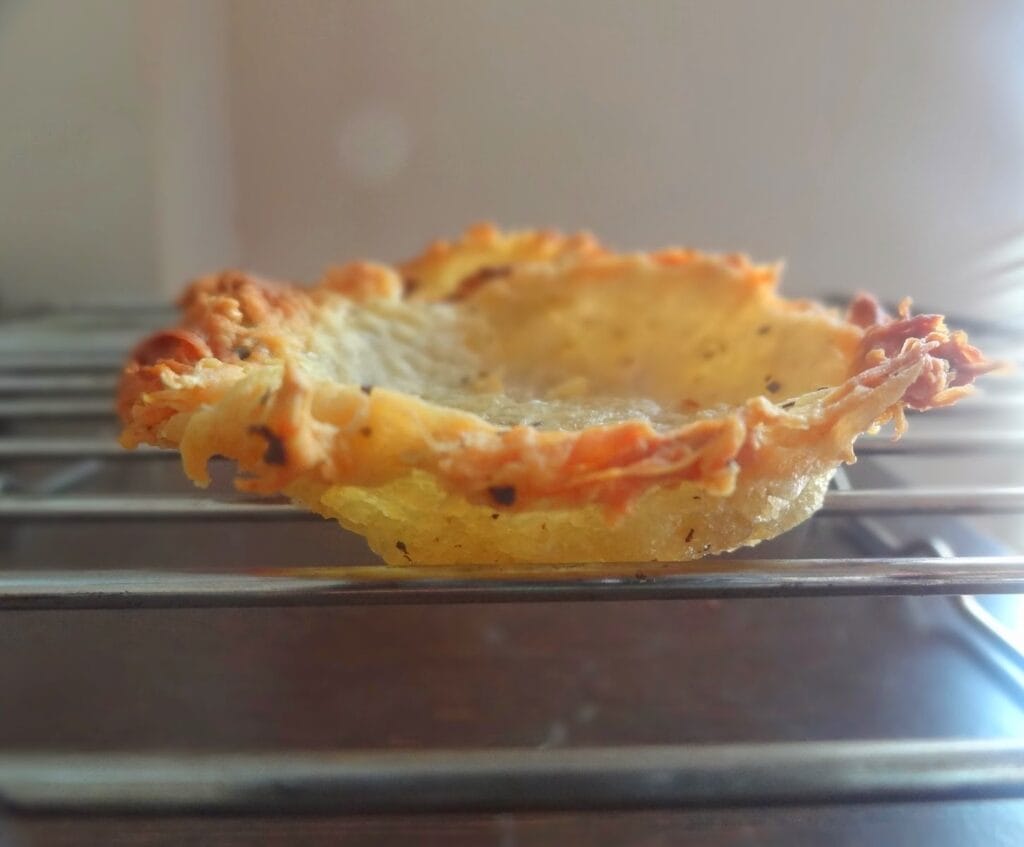 My Love and Hate Relationship With Food: Creating Extraordinary 3 a shining baked grated potato basket baked in over and sitting on a steel rack